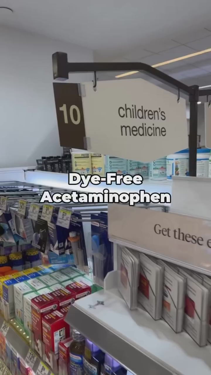 a Doctor strolling the medicine aisle for children's medicine 
